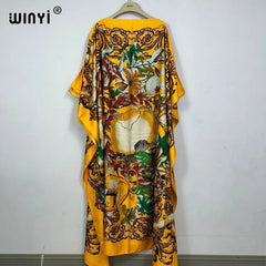 Elegant African Beach Dress: Boho Print for Evening Parties and Beach Outfits Flexi Africa Free Delivery www.flexiafrica.com