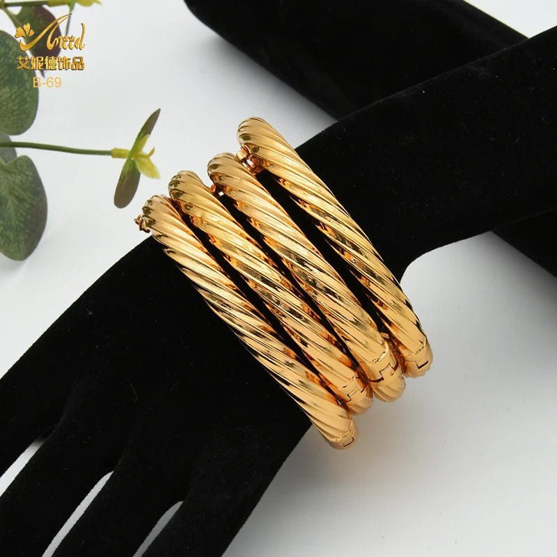 Luxurious African Jewelry: Gold-Toned Copper Bangle Bracelet for Women - Flexi Africa - Flexi Africa offers Free Delivery Worldwide - Vibrant African traditional clothing showcasing bold prints and intricate designs